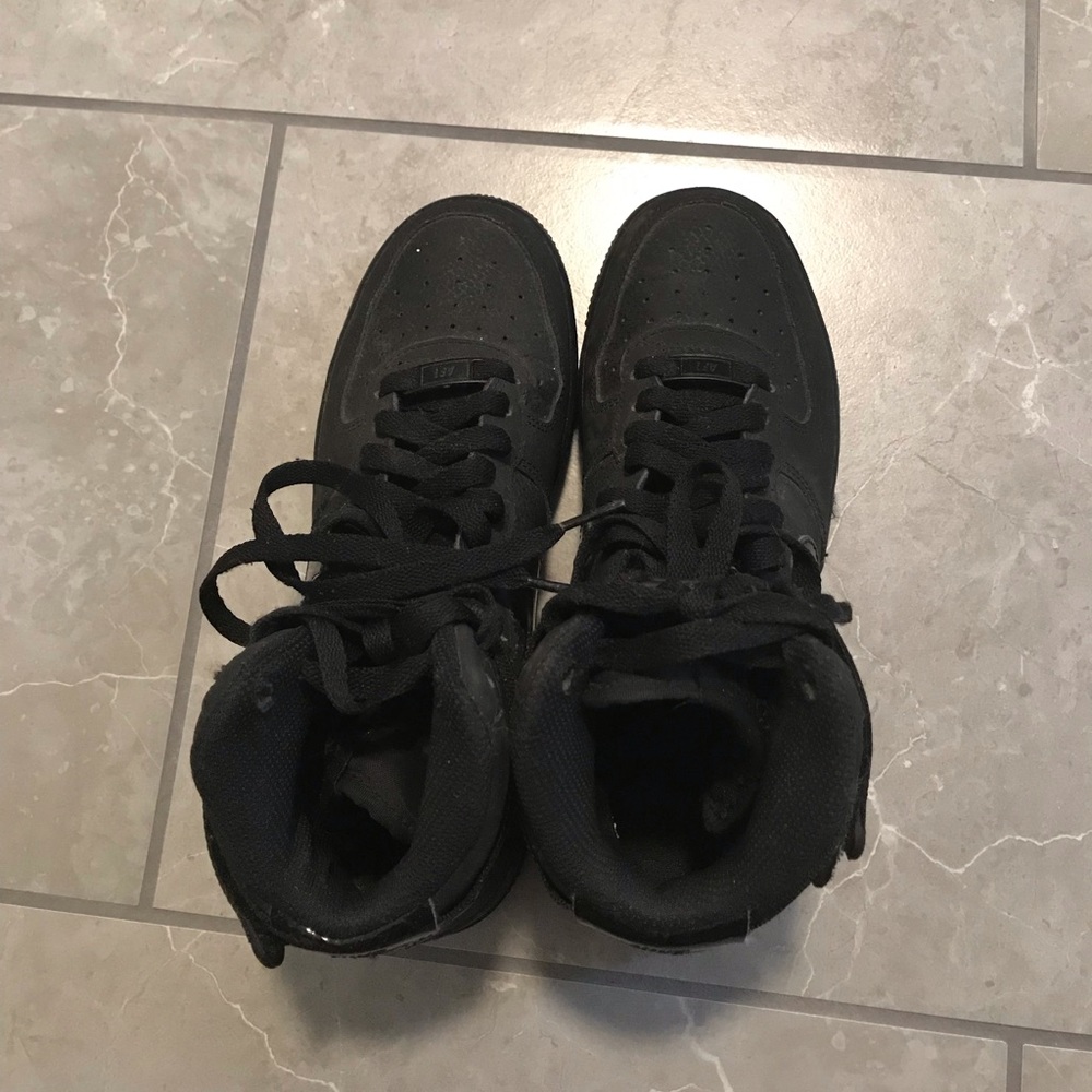 High top black Air Force 1s